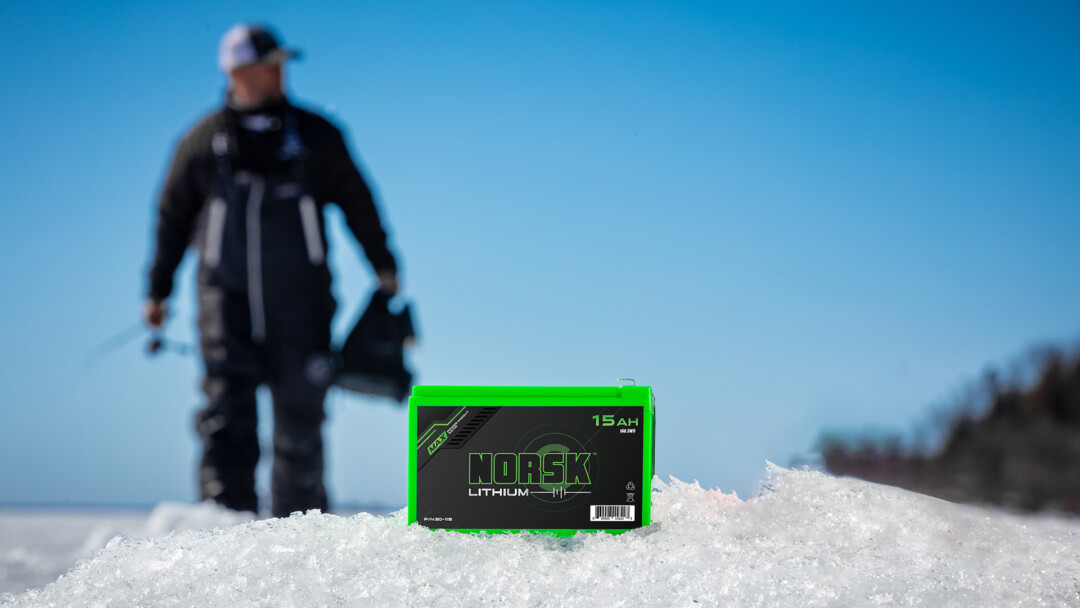 Norsk Lithium 15AH Battery with angler in the background 1080X1920