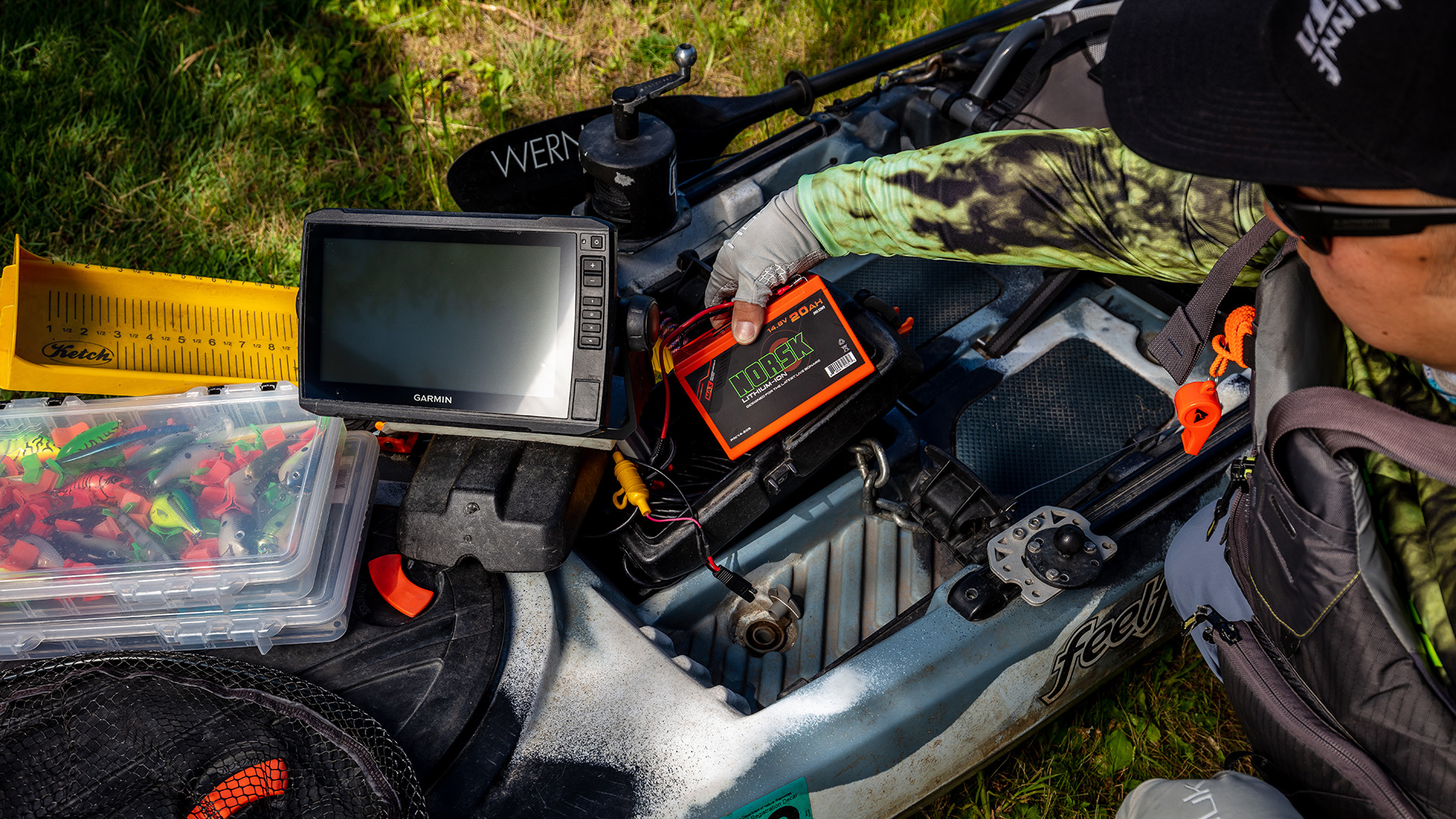 Norsk Lithium Kayak angler prepping to power his electronics with a Norsk 20Ah Lithium ion battery 1920X1080