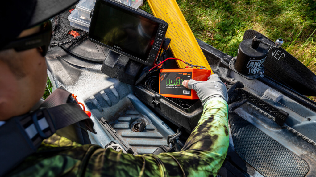 Norsk Lithium Kayak angler prepping to power his electronics with a Norsk 20Ah Lithium ion battery 2 1920X1080