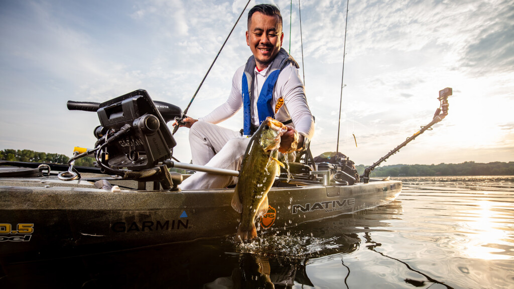 Rocky Vang catching largemouth bass from his kayak powered by a Norsk Lithium Battery copy