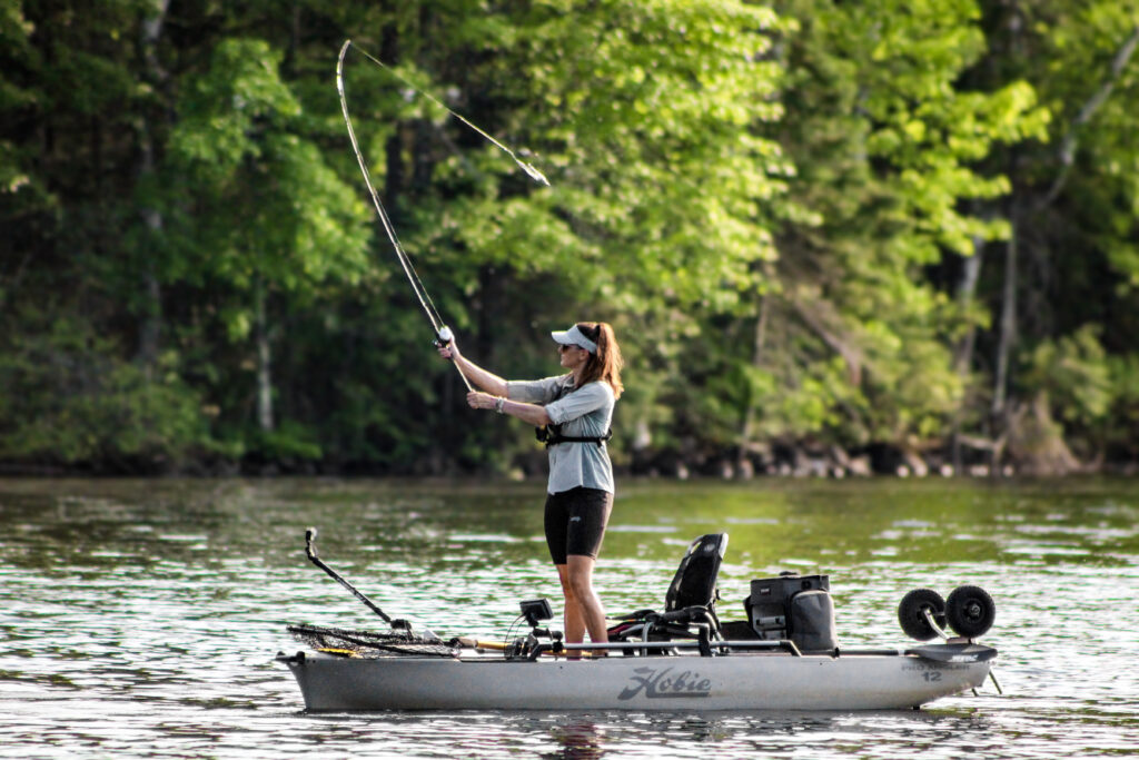 Nicole Lynn Norsk Pro Staff kayak angler casting for muskies using Norsk Lithium battery to power electronics 3