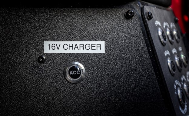 Accessory button for 16V DC to DC charger at fishing boat dash