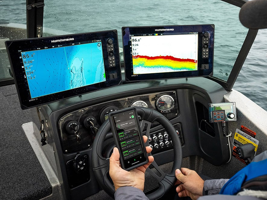 Angler checking the power status of his Lithium Starting Battery via the Norsk Guardian appV2 1