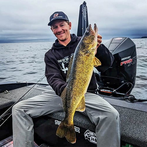 Brett Walser Walleye In Back Of Boat 500 x 500