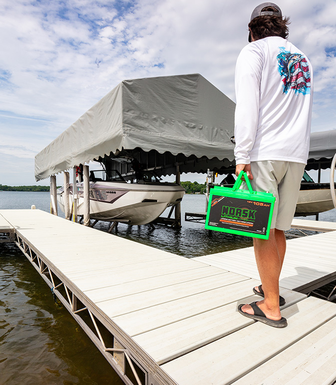 Dock owner upgrdading his boat lift to a Norsk Lithium Boat Lift Battery