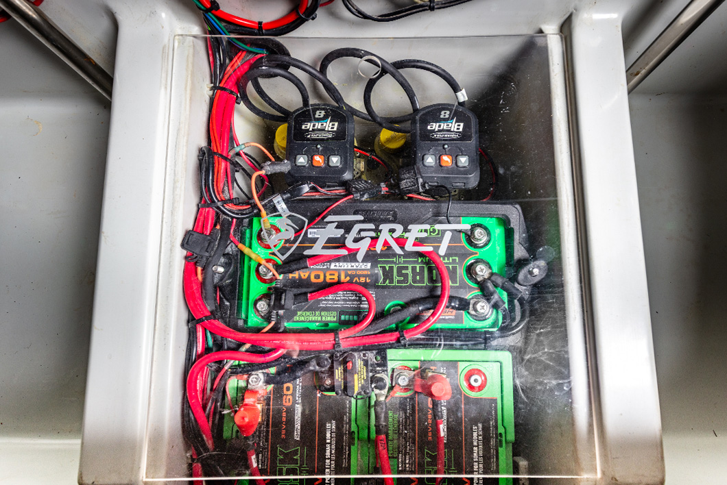 Marine battery rigging with electronics and accessory loads connected in a bass boat