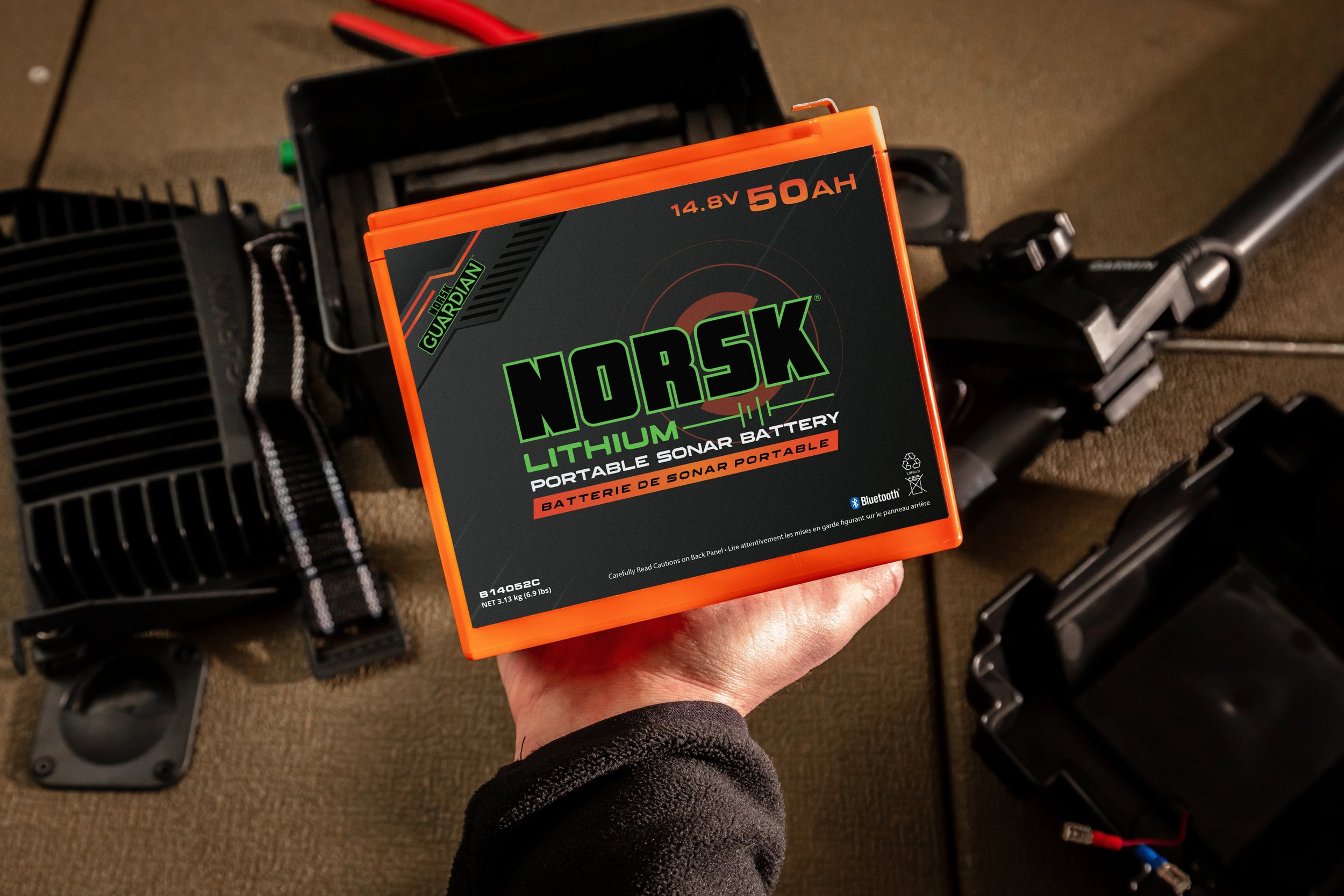 Compact Norsk Lithium portable sonar battery installed for dedicated electronics power